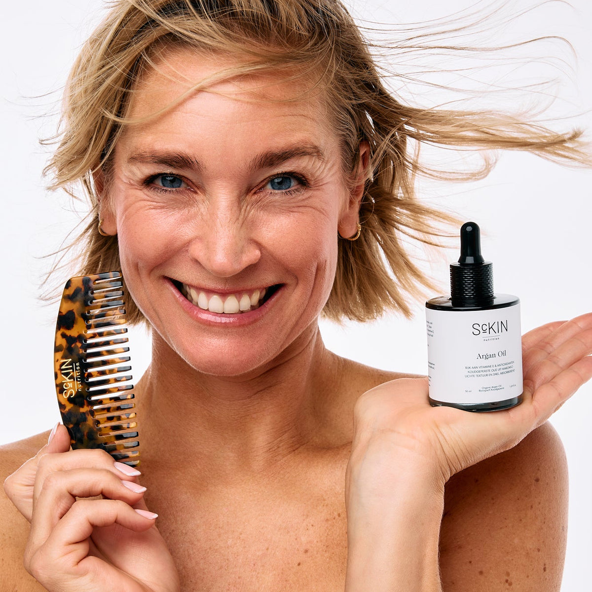 argan vrouw haarkam